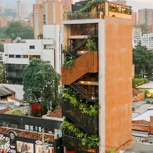 Отель The Somos Beats & Rooftop